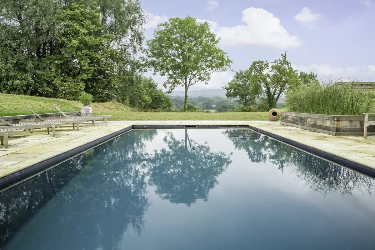 fibreglass pool vs concrete pool shell uk