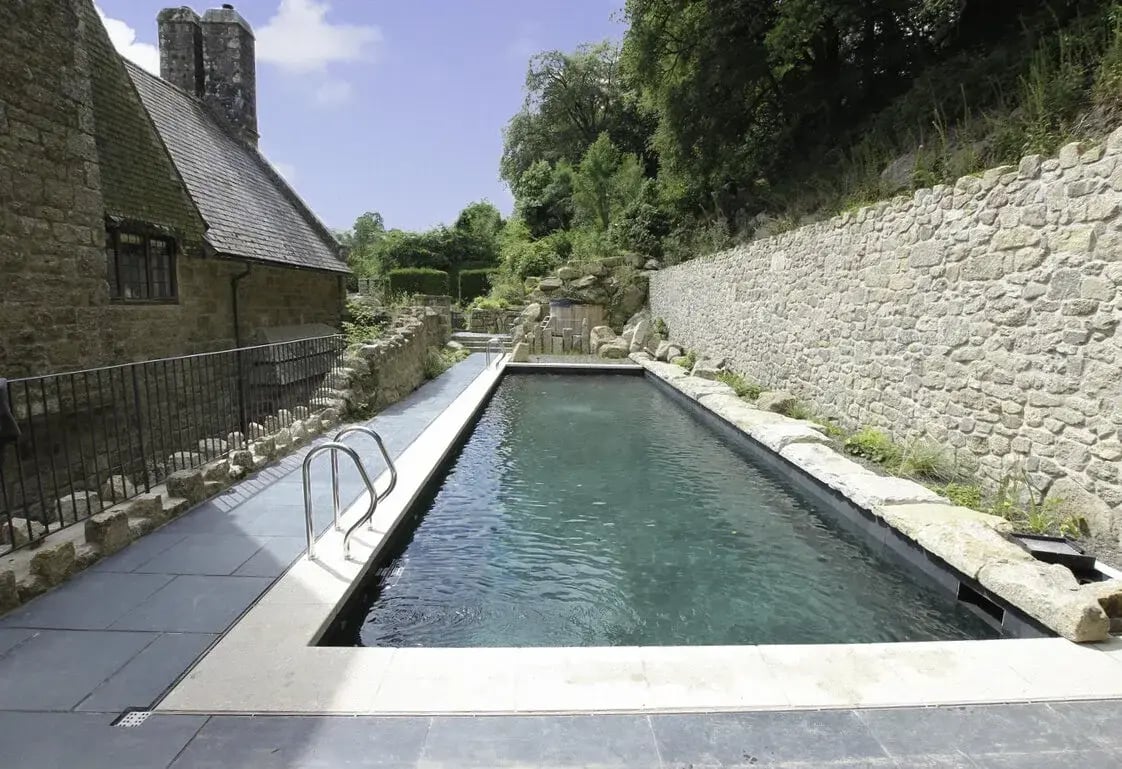 swimming pool heating systems uk cost